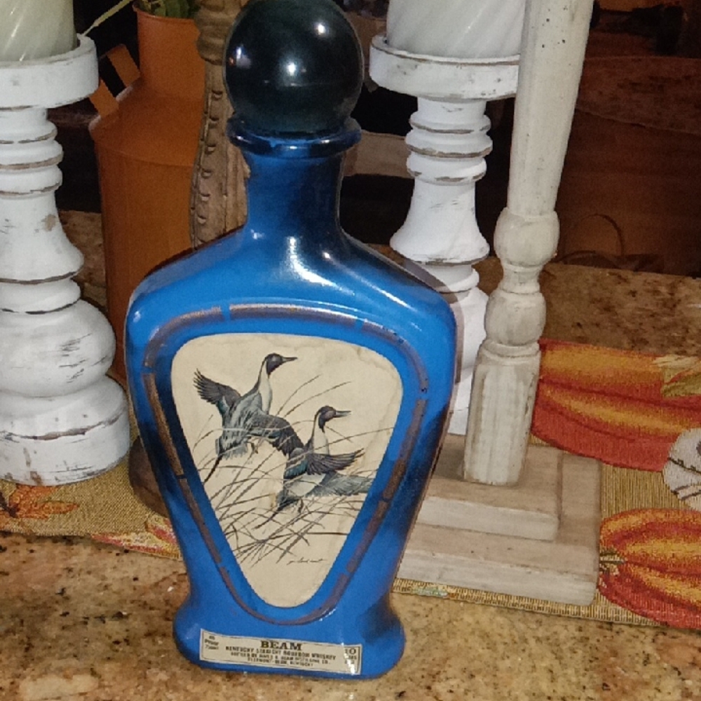 Blue Decorative Bottle with Wildlife Design